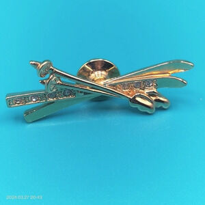 Avon Gold Tone Fashion Skis Pin Lapel 1 3/4" Clear Rhinestones Accents